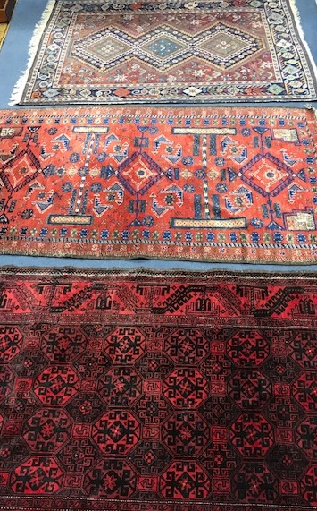 Three Caucasian rugs 190cm. x121cm., 180cm. x 110cm., 166cm. x 130cm.